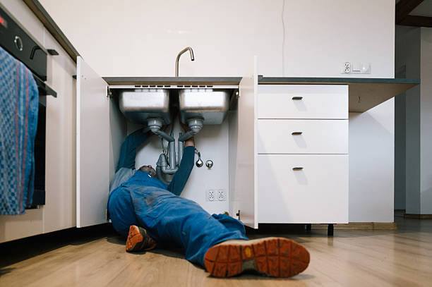 Professional Emergency Plumber technician working in Grain Valley, MO